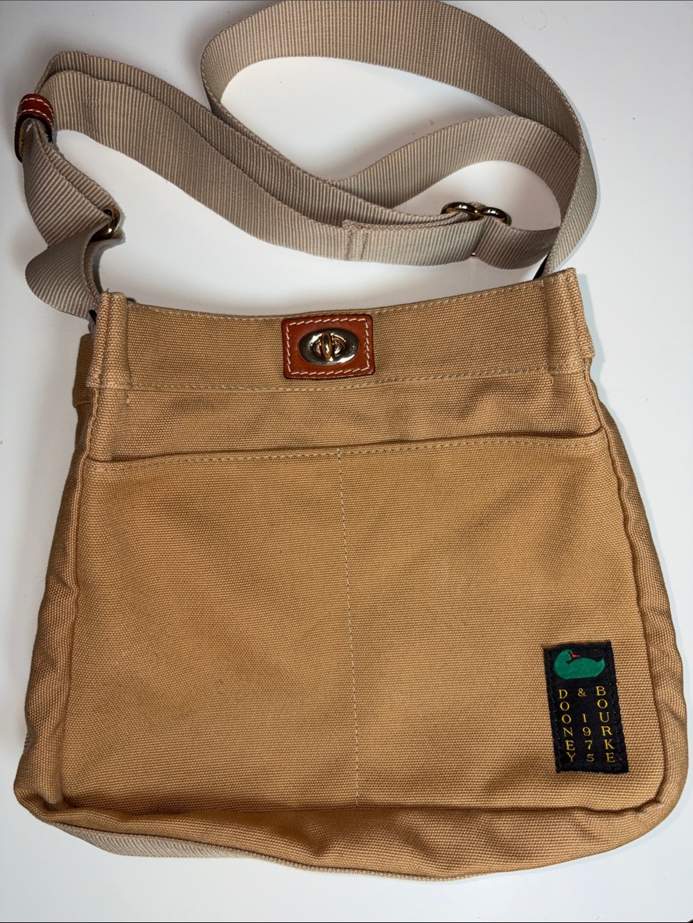 Dooney & Bourke Tan Canvas Messenger Crossbody with Leather Trim